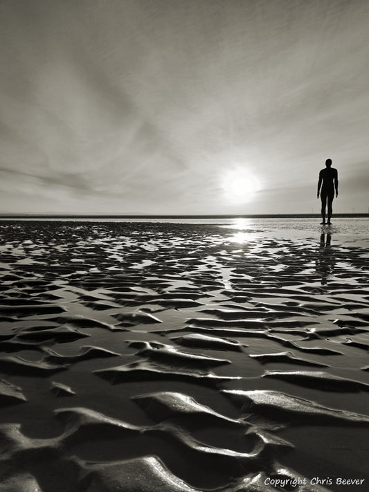 Antony Gormley`s Another Place Crosby Liverpool Merseyside Landscape print wall art and home office décor by Wigan UK Landscape Artist and Photographer Christopher Beever Available as a S to XXL landscape, Canvas, poster, aluminium, wooden, Acrylic, framed, print, wall art, Cushion, sofa throw, blanket, wall mural. 